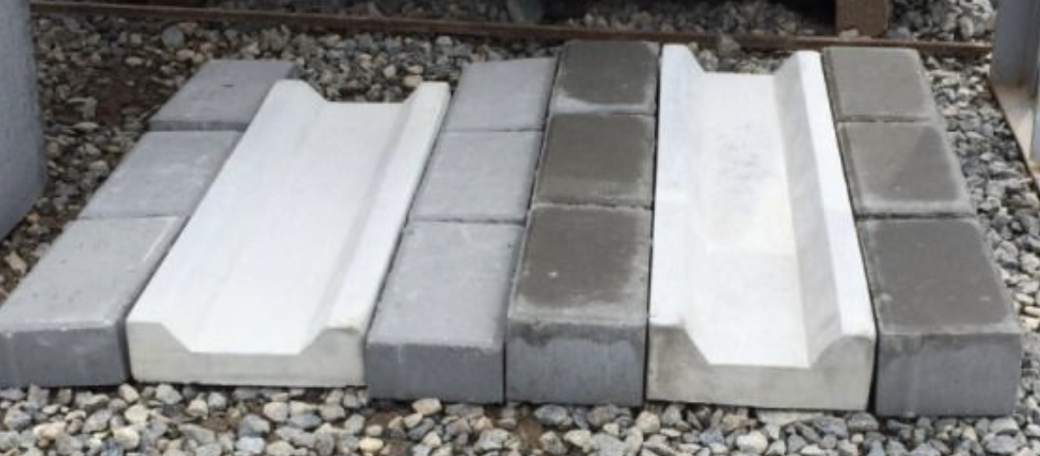 Изготовление бетонных водостоков на заводе: преимущества, качество и роль